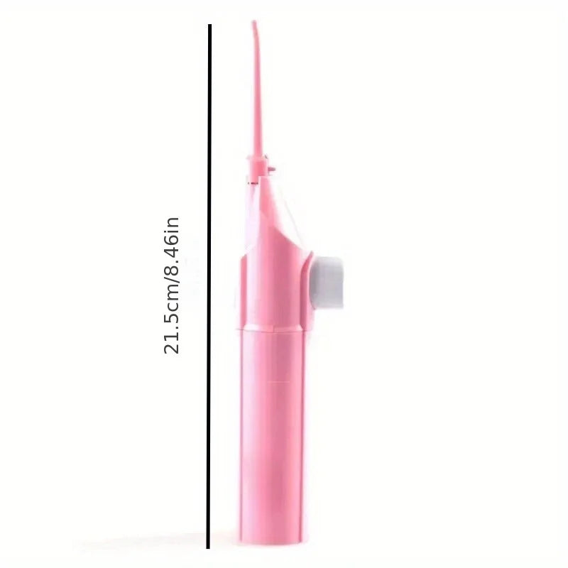 Portable high-pressure oral irrigator - manual tooth cleaner with grip, nozzle attachment for gum health